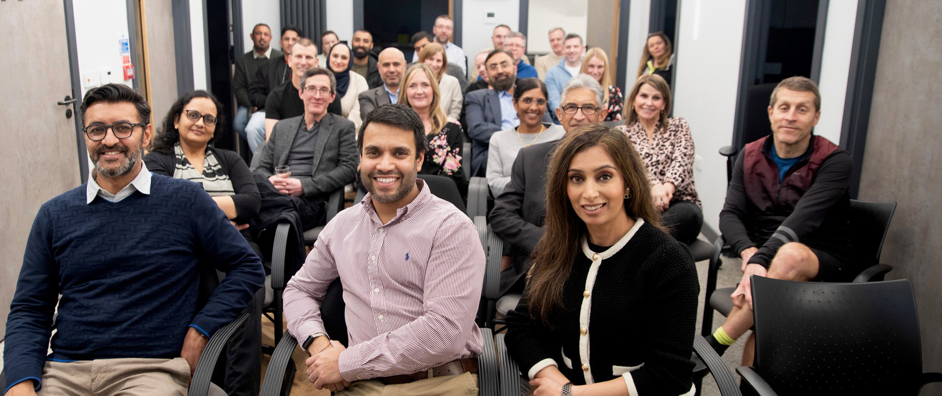 The full Glasgow Private Clinic team gathered in the clinic seminar room